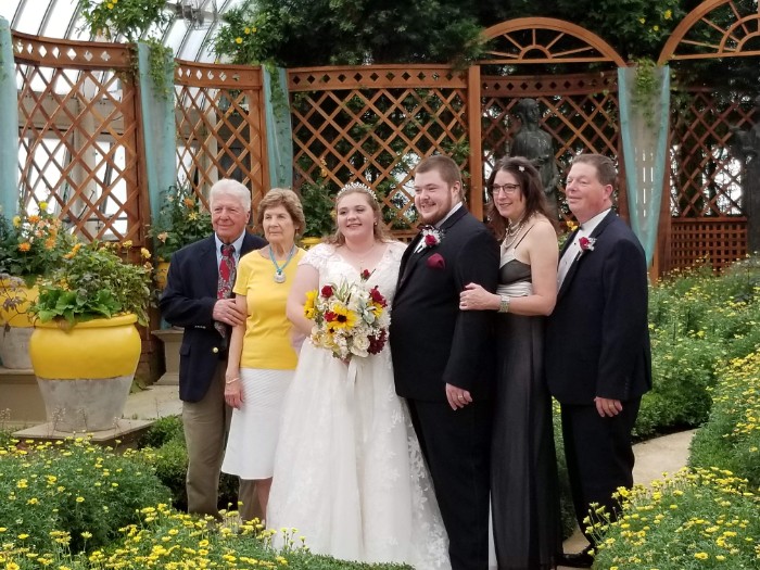 a group of people standing next to each other