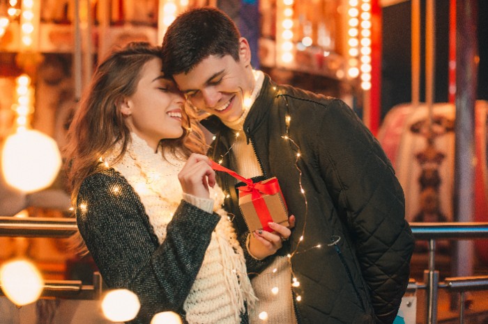 A person and person kissing Description automatically generated with low confidence